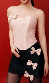STRAPLESS CROP TOP WITH BOW EMBELLISHED SKIRT