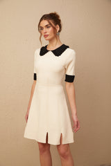 Andréa white split-hem knitted mini dress