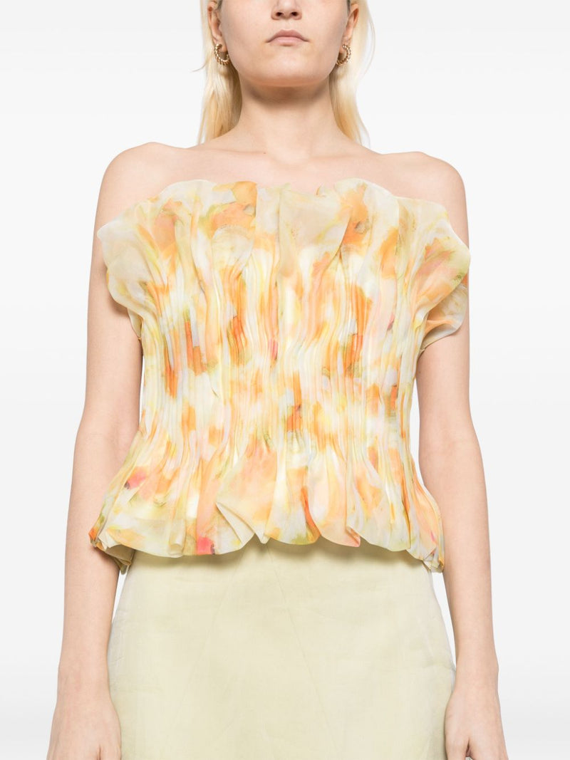 print ruffle trim top in yellow