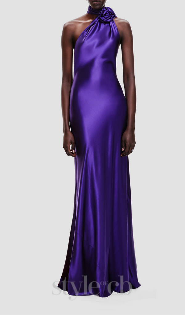 satin wrap halter gown with flower in purple