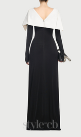 black maxi dress with draped asymmetrical shoulder pleat