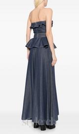 SIGRID PEPLUM-WAIST DENIM JUMPSUIT IN NAVY BLUE