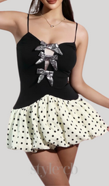 bow polka dot patchwork mini dress in black