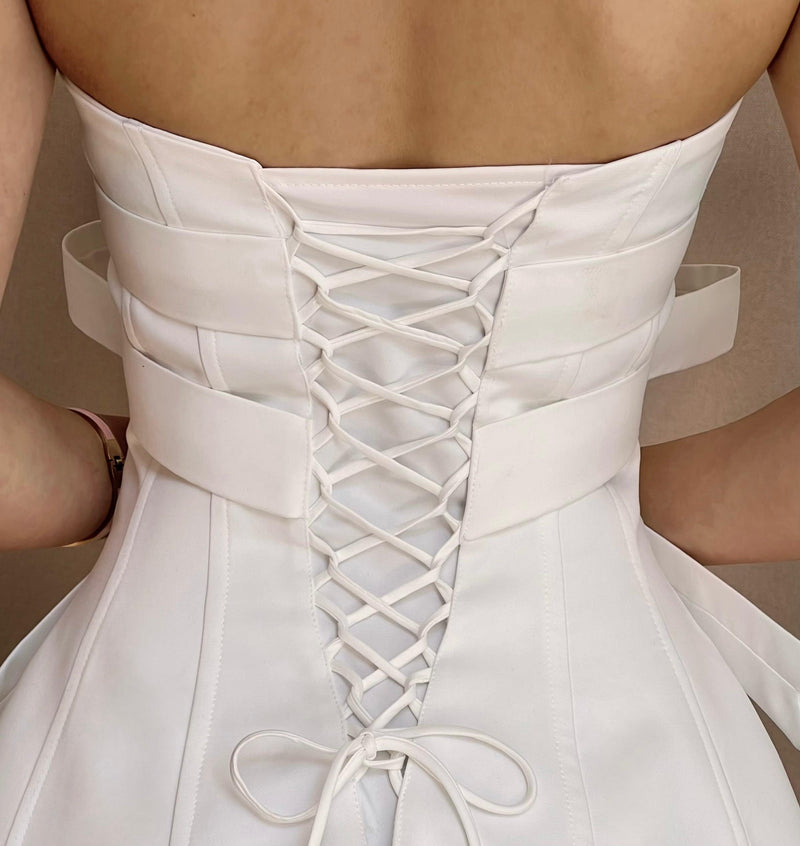White Bow embellished strapless Mini Dress