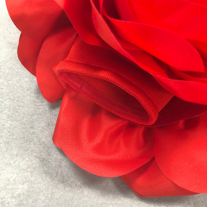red strapless maxi dress with flower embellishments