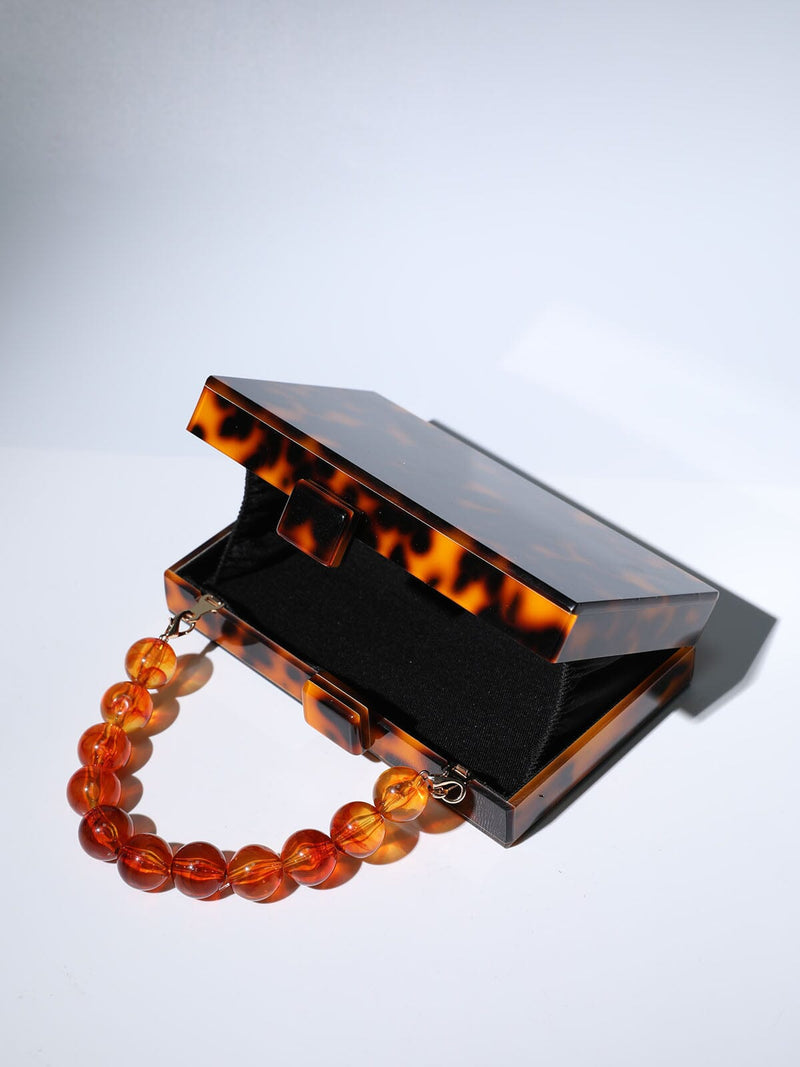 ACRYLIC BEADED CLUTCH IN AMBER Bags Oh CICI 